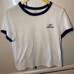 White shirt with hollister embroidered in front